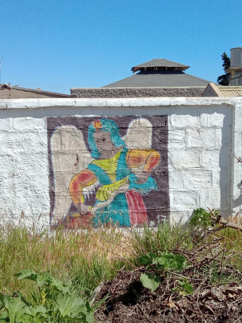 Figure painted on a small wall