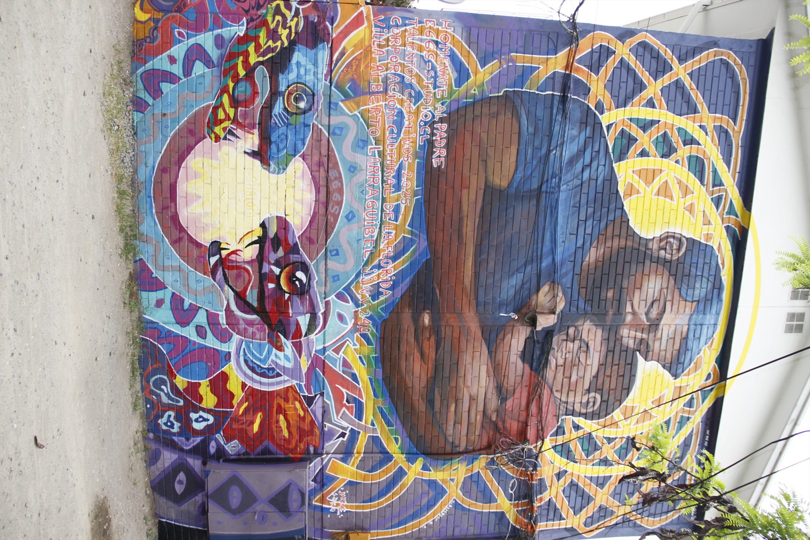 Detalle del retrato mural Al Padre